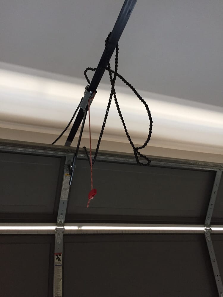 Garage door opener chain repair