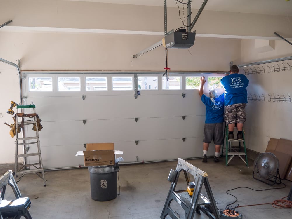 The L&S Garage Door team installing a garage door in North Orange County